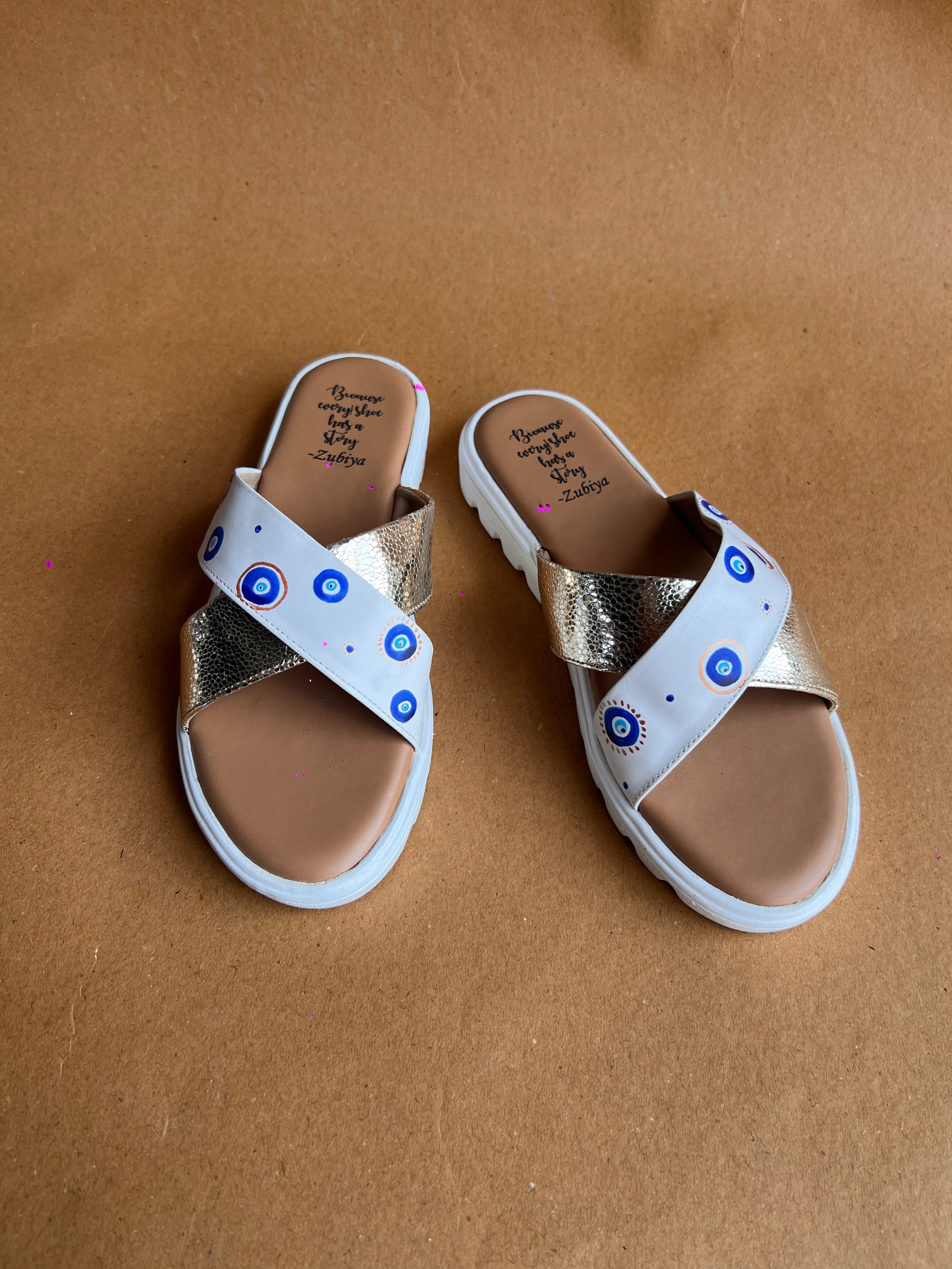 Evil eye criss cross slides