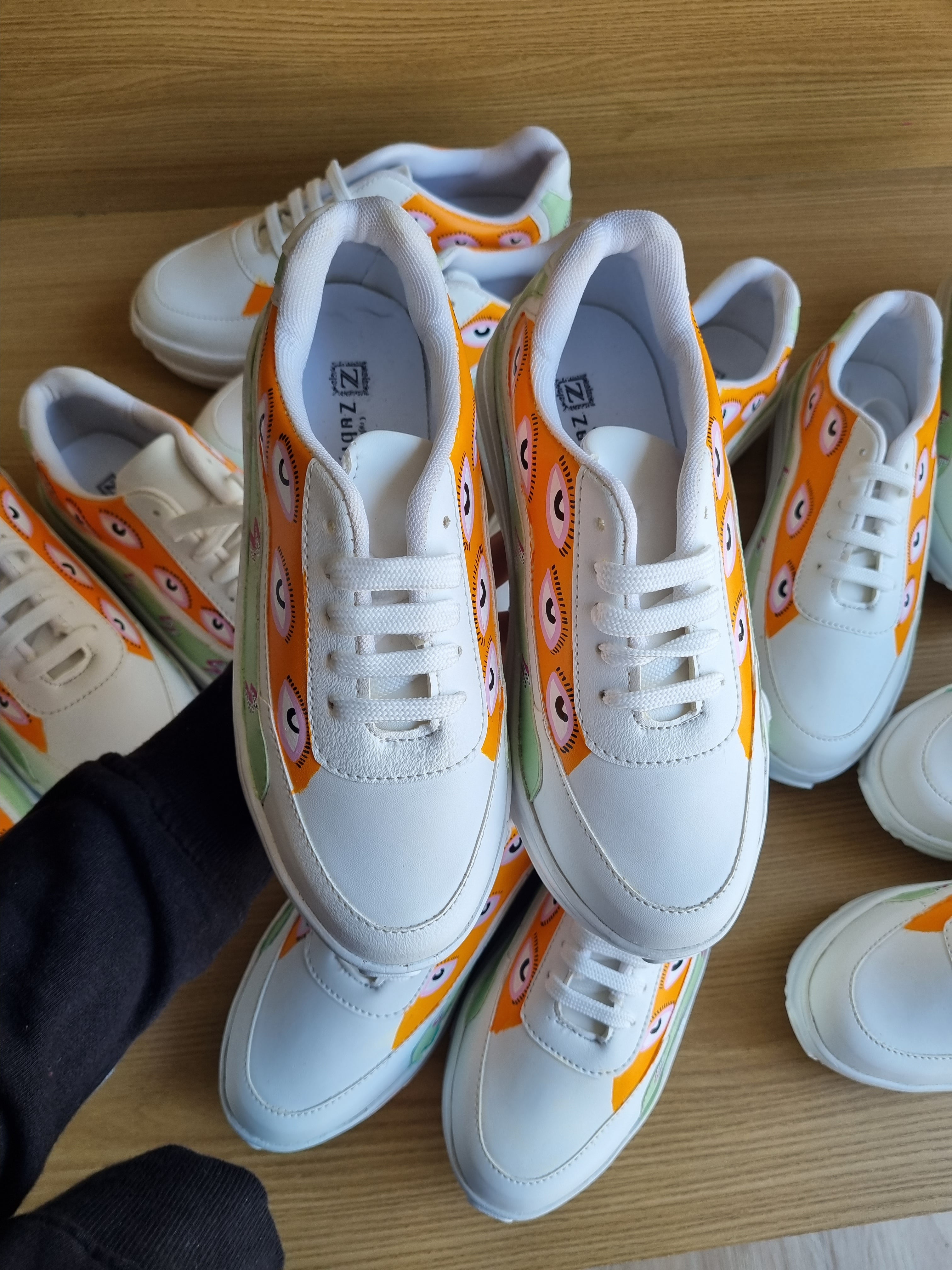 Sneaky evil eye sneakers