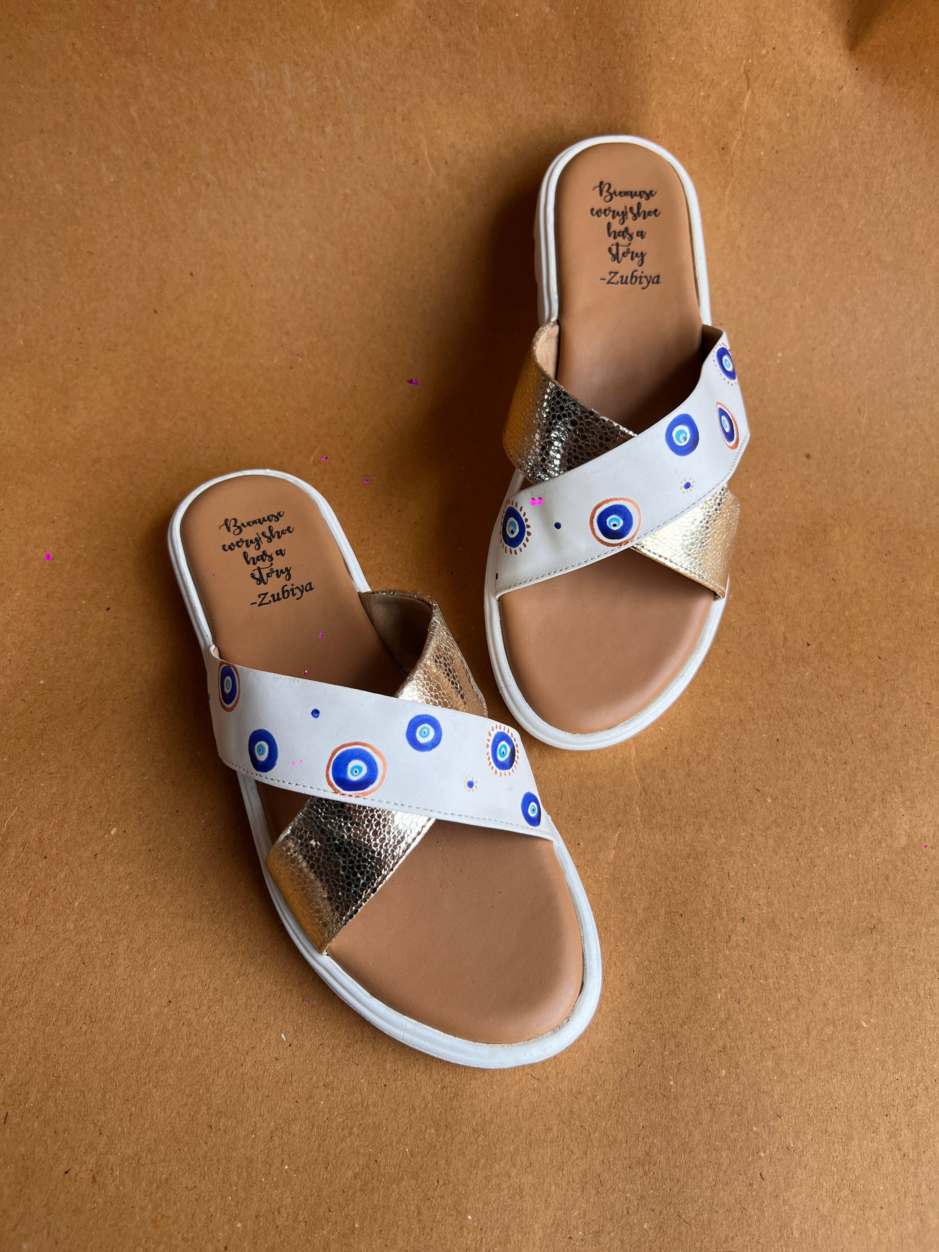 Evil eye criss cross slides