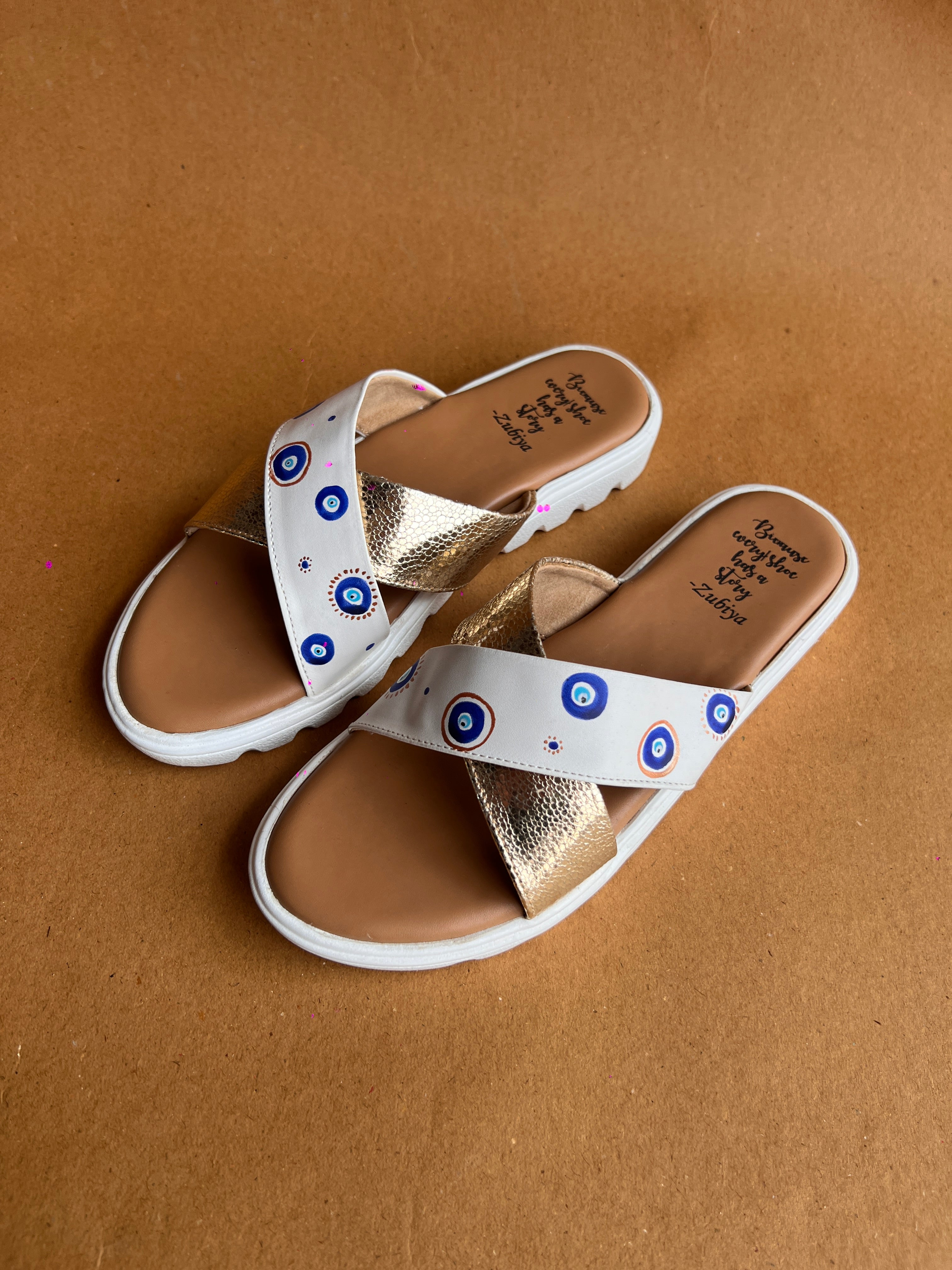 Evil eye criss cross slides