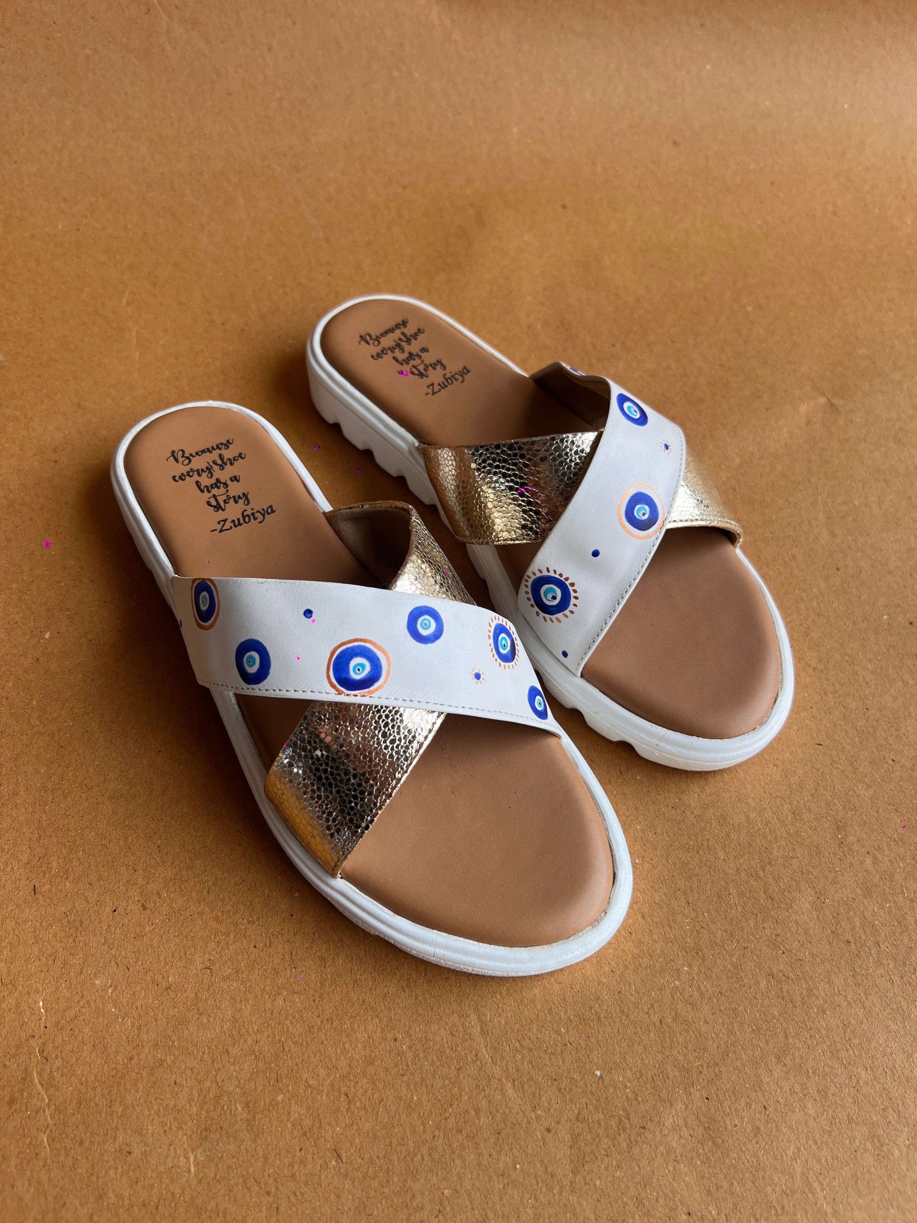 Evil eye criss cross slides