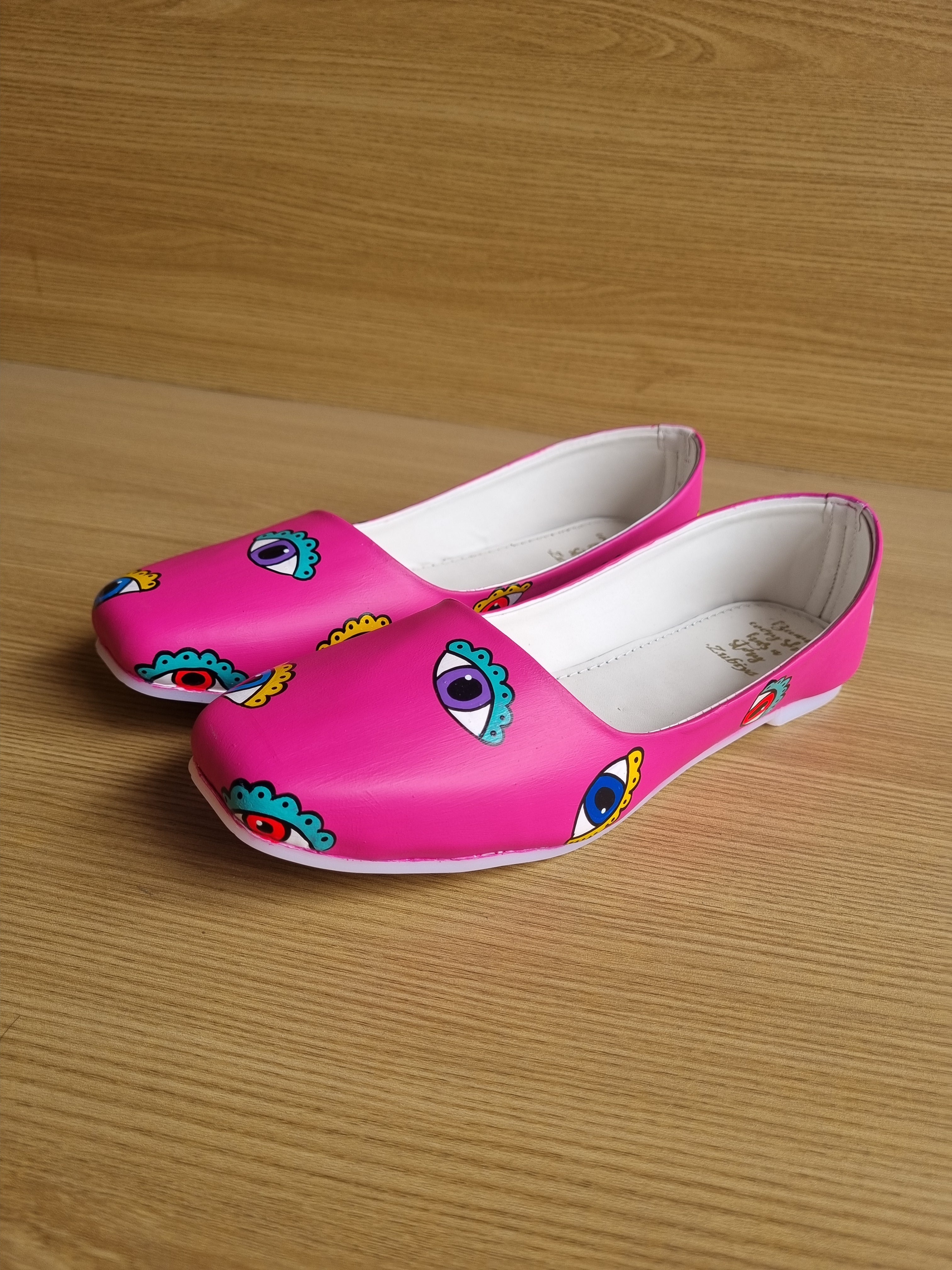 Pink evil eye bellies