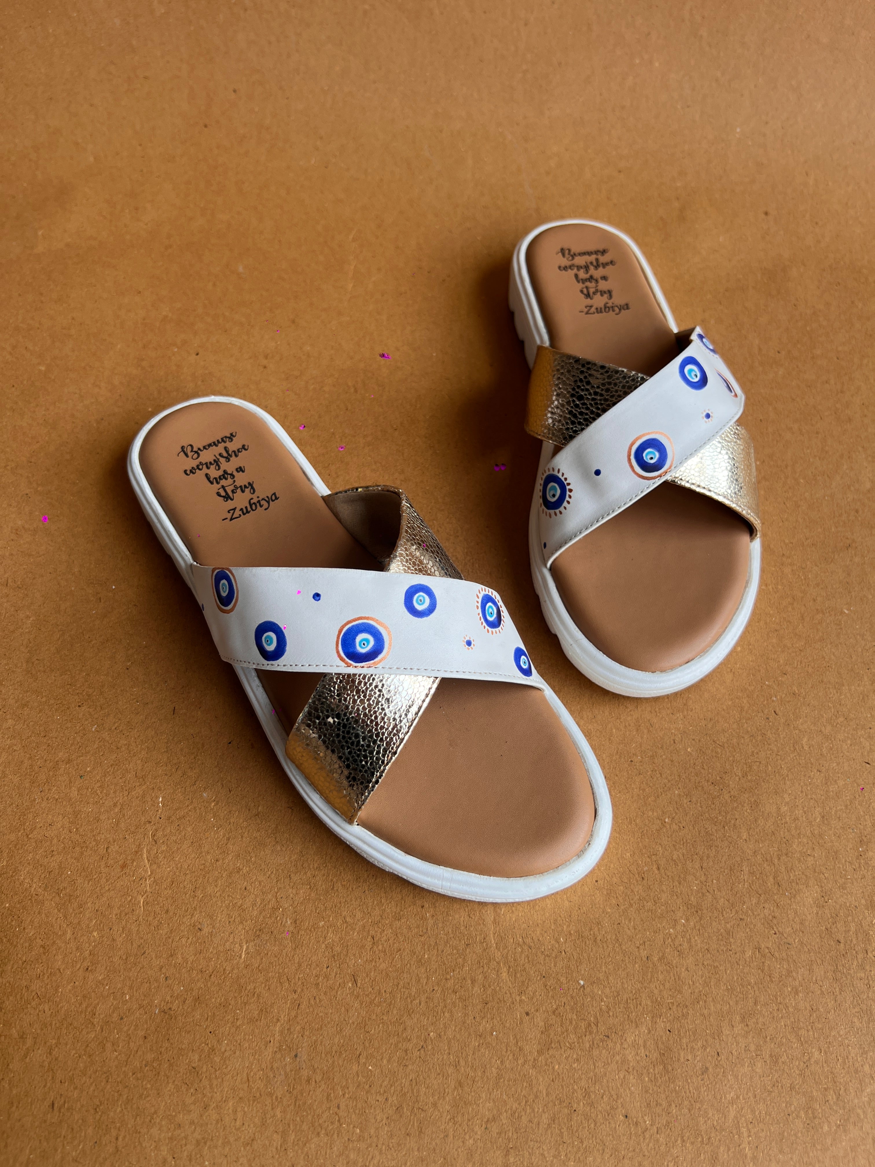 Evil eye criss cross slides