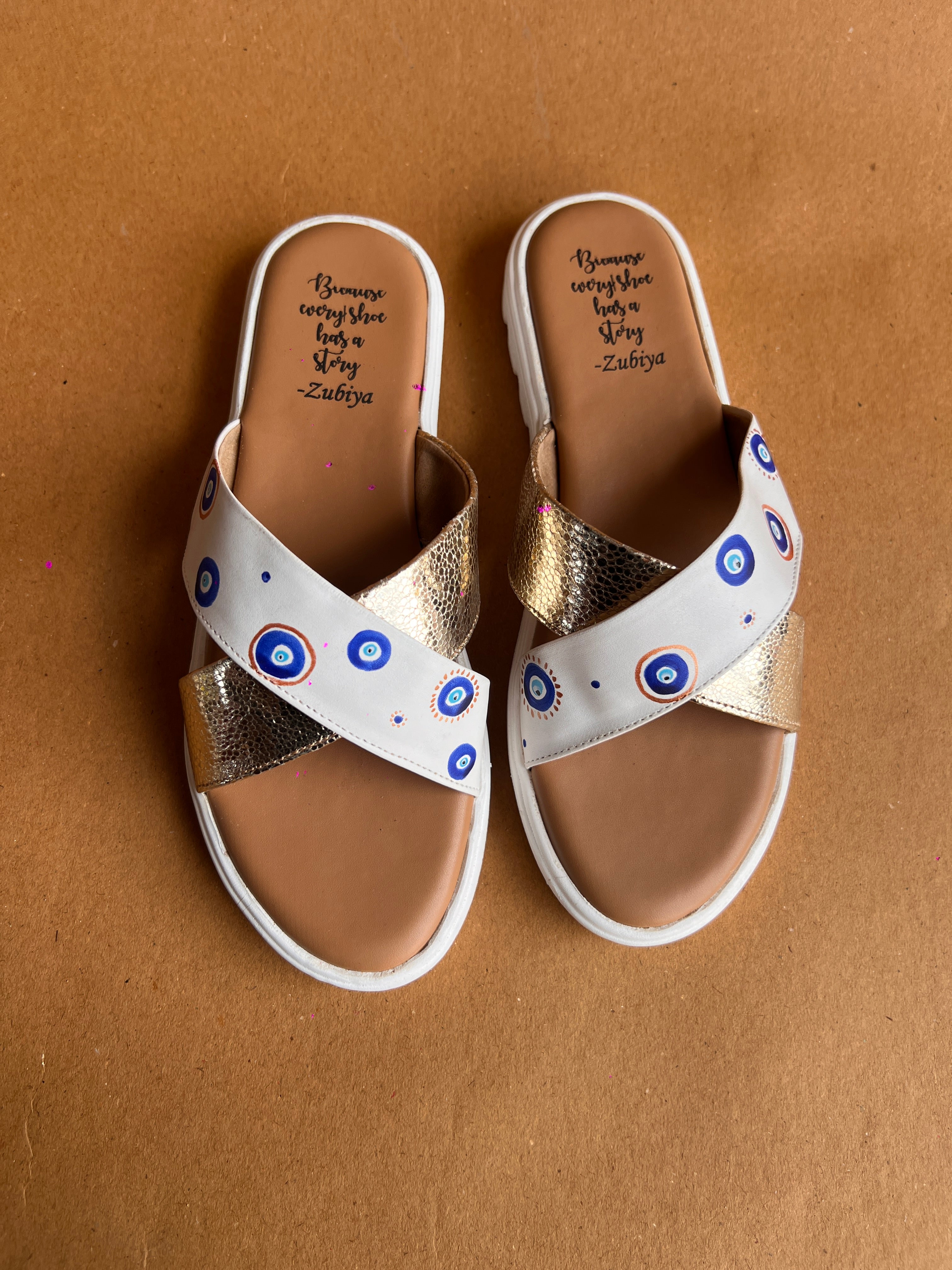 Evil eye criss cross slides