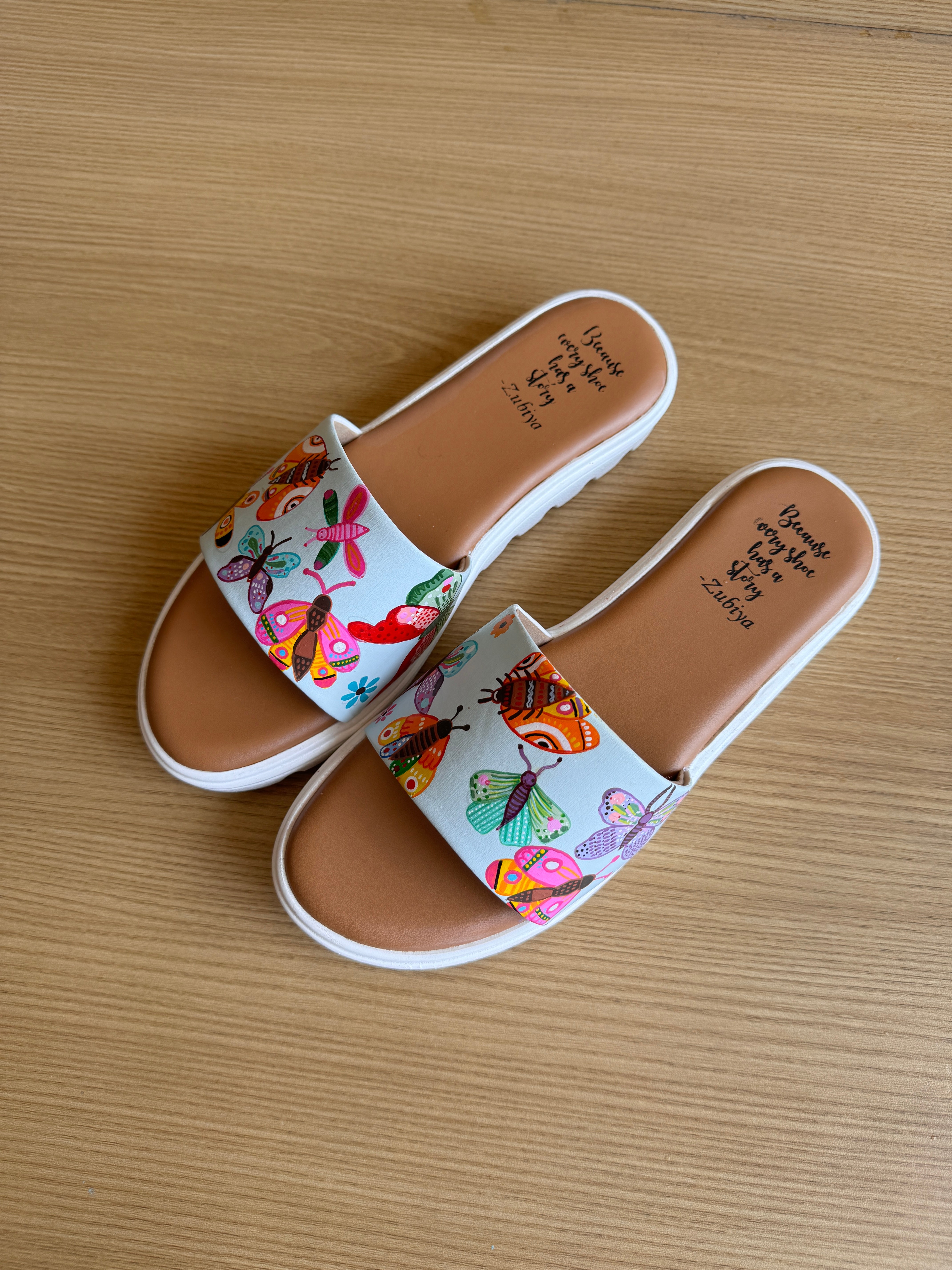 Butterfly fly away white sole slider