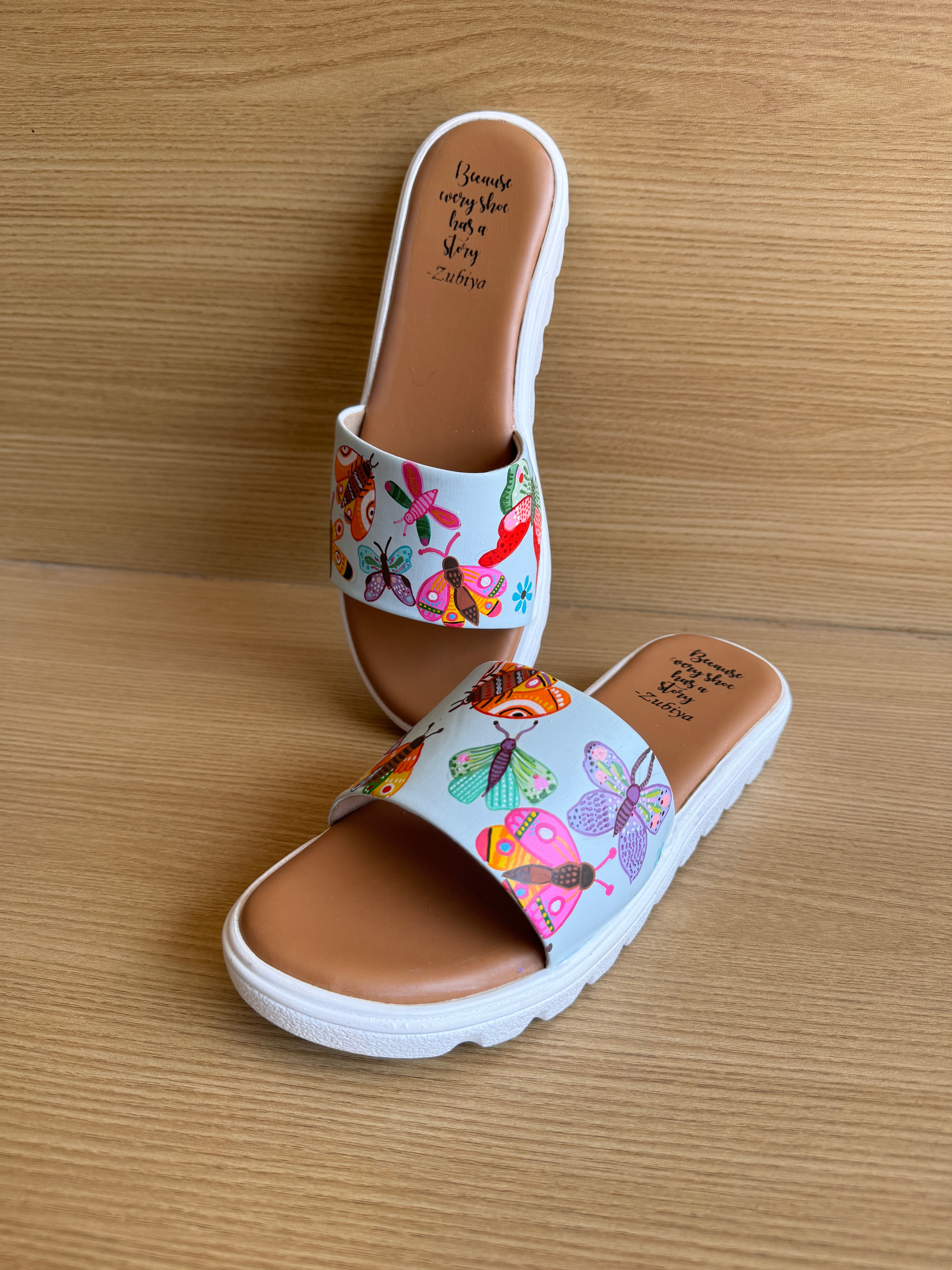 Butterfly fly away white sole slider