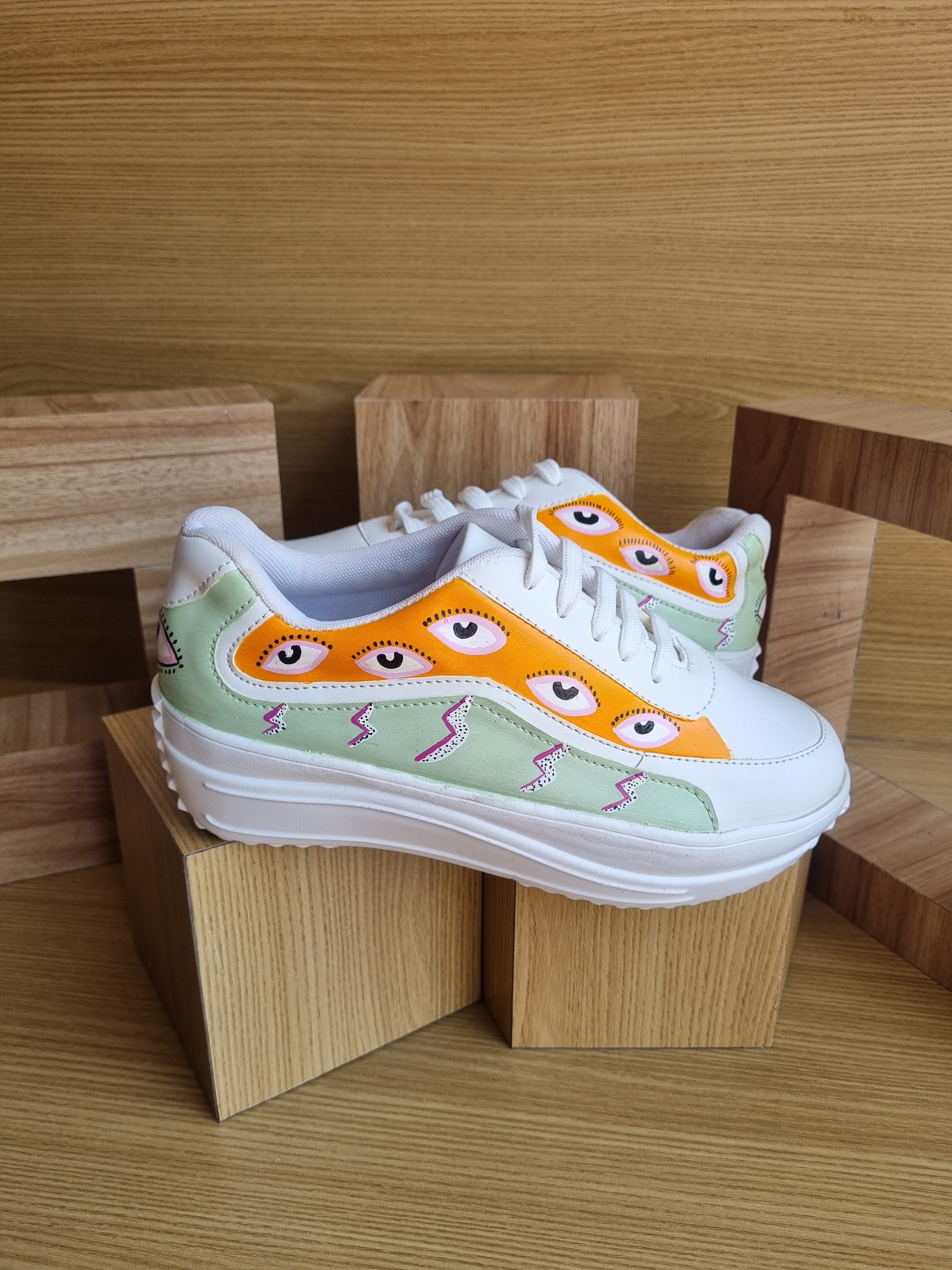 Sneaky evil eye sneakers