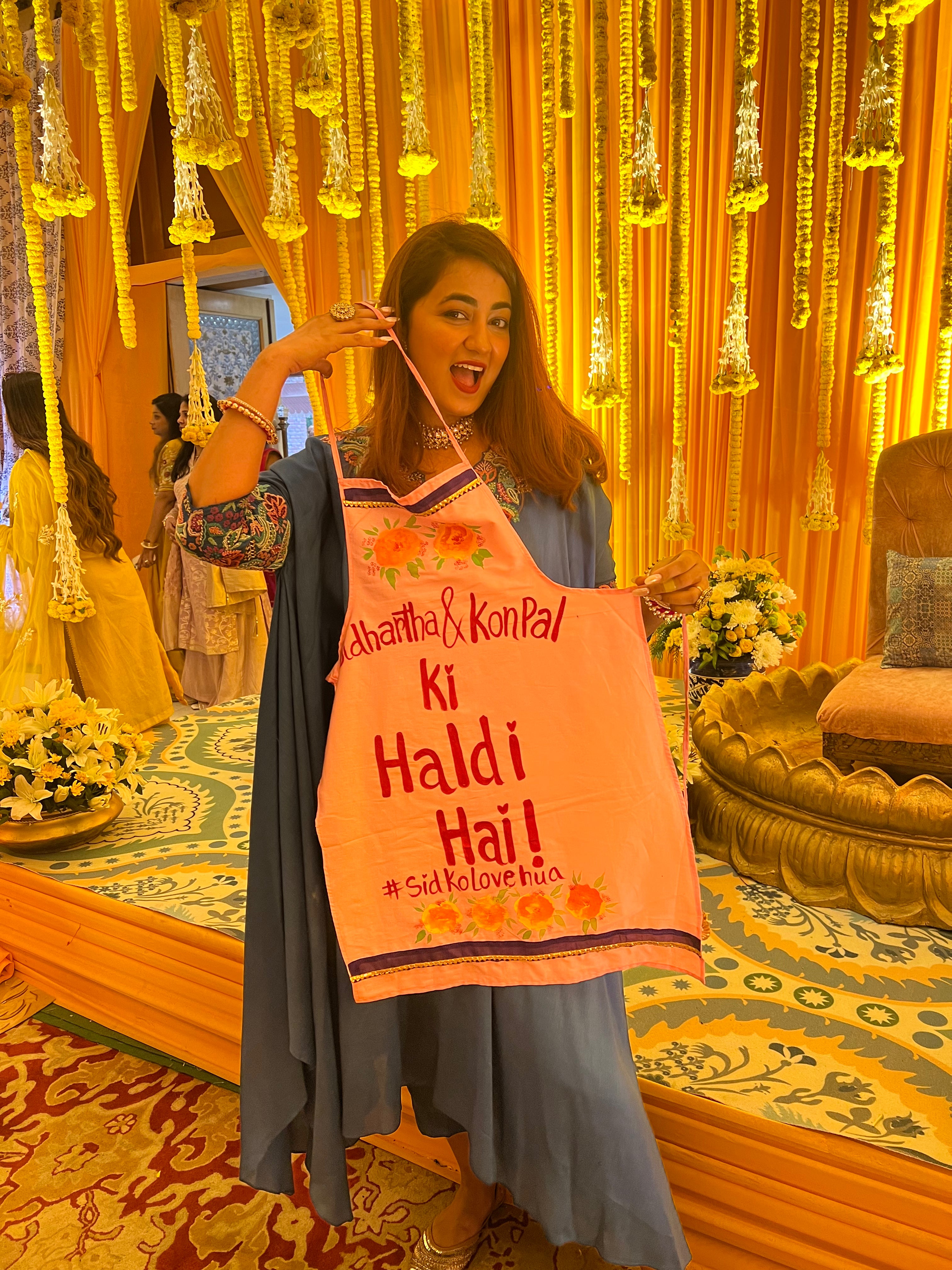 Baby pink apron with couples name + hashtag