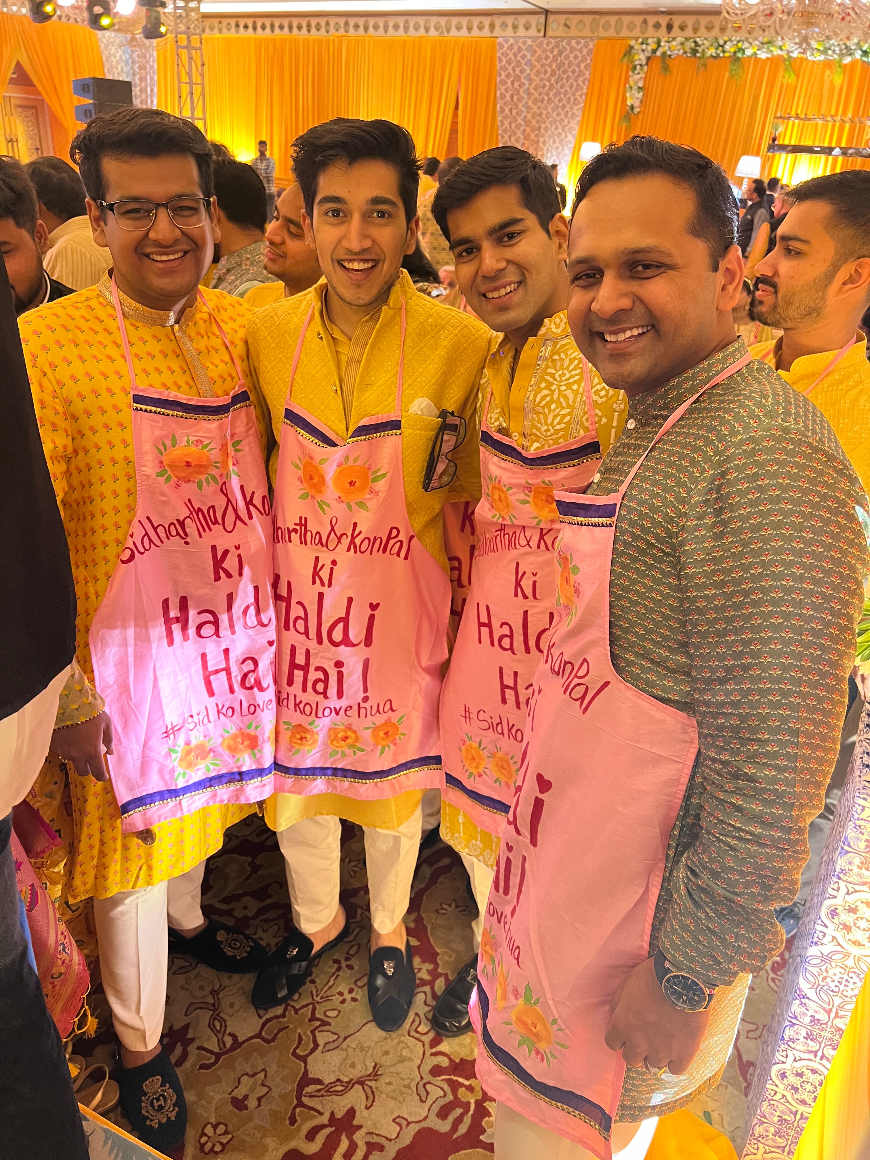 Baby pink apron with couples name + hashtag