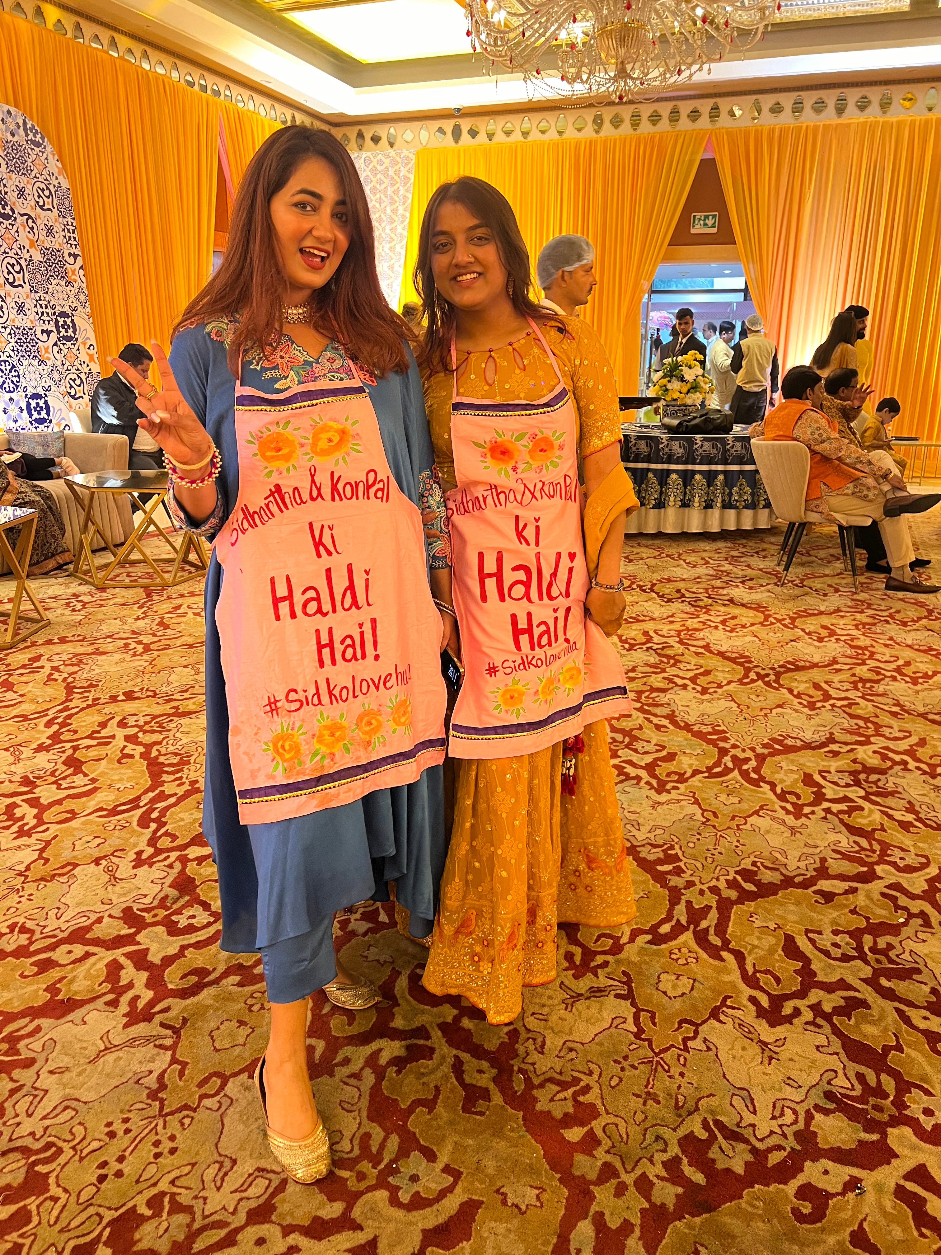 Baby pink apron with couples name + hashtag