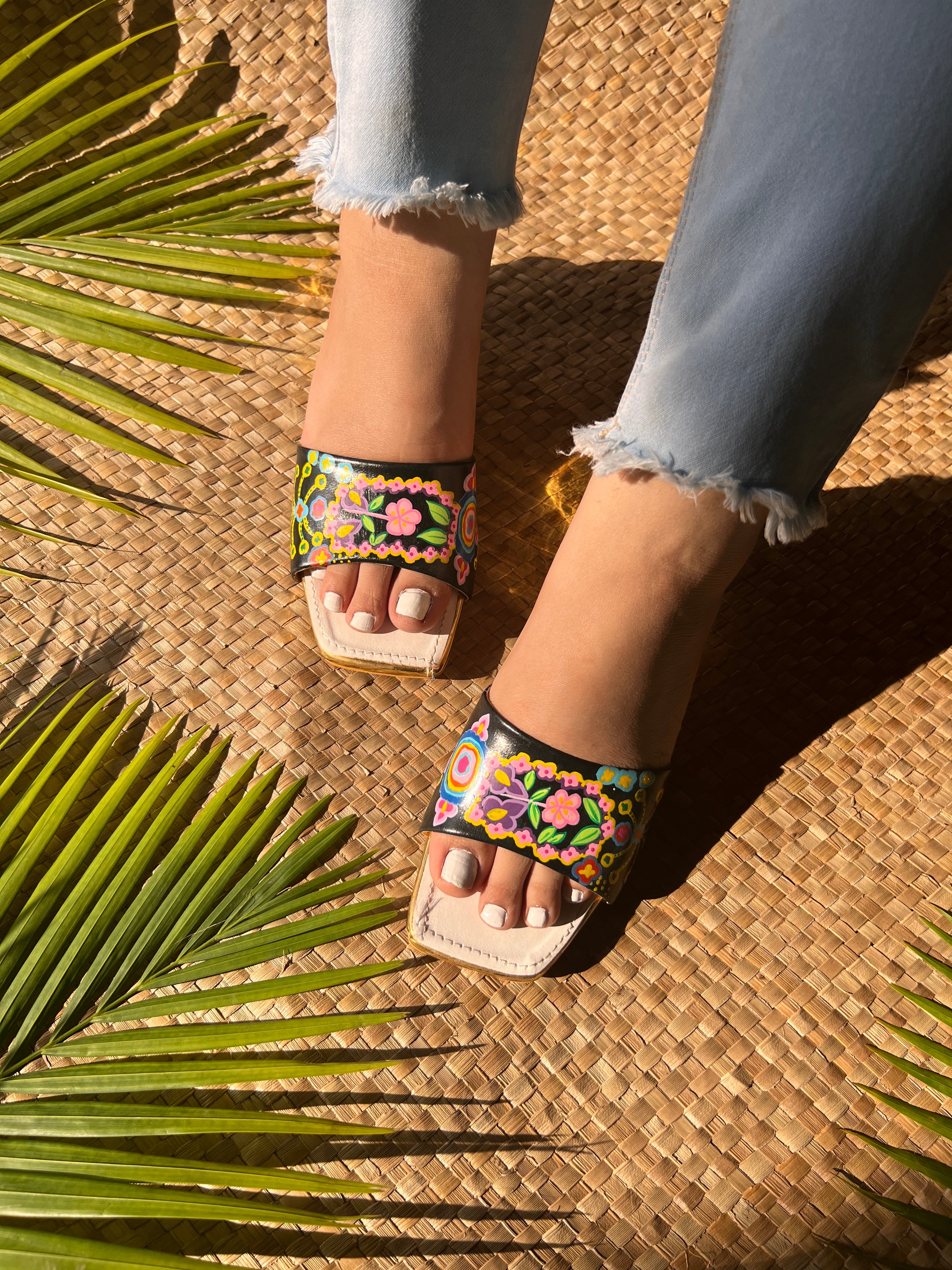 Quirky black hatke heels